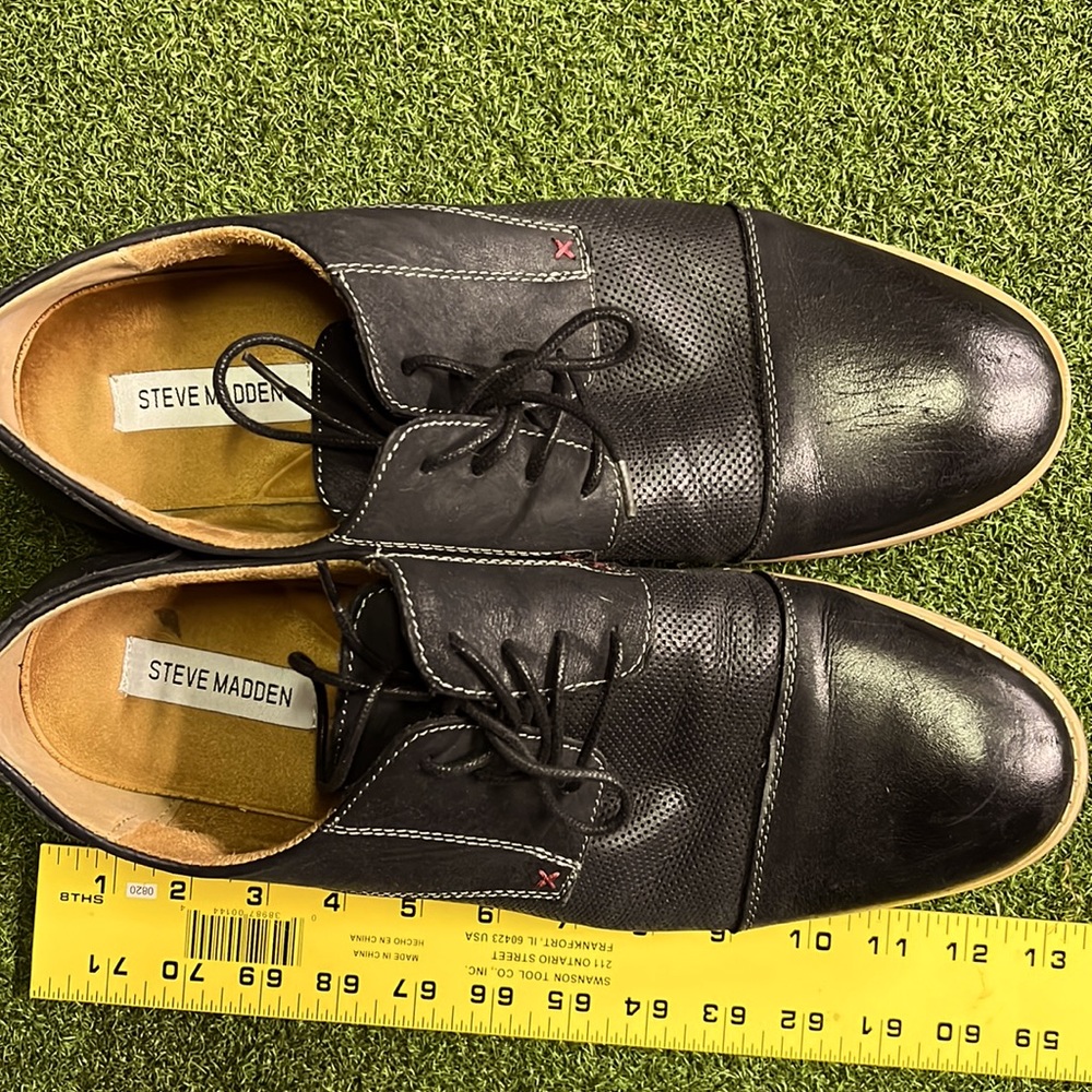 Steve Madden black dress shoes.
